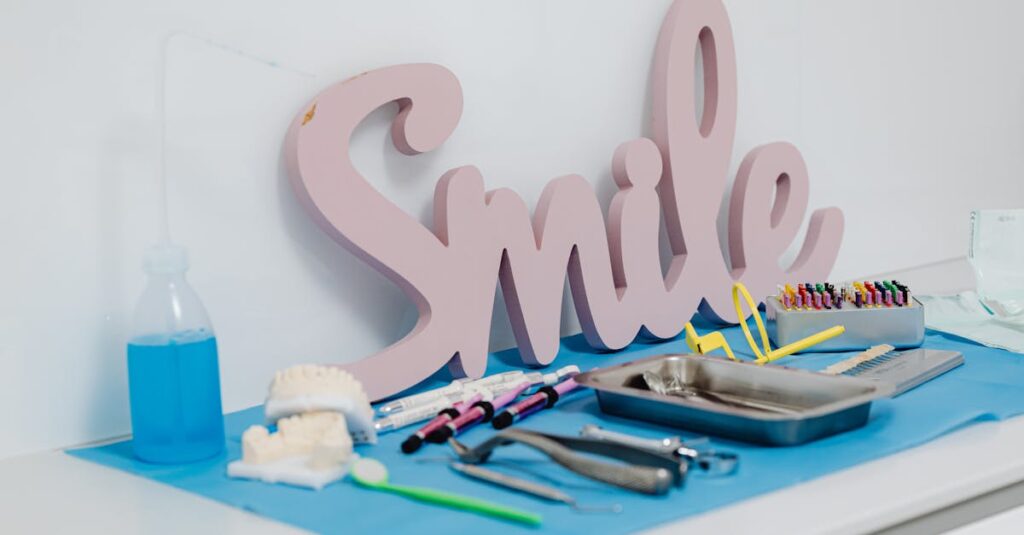 Collection of dental instruments on clinic desk, featuring a 'Smile' decor piece, promoting oral care and hygiene.